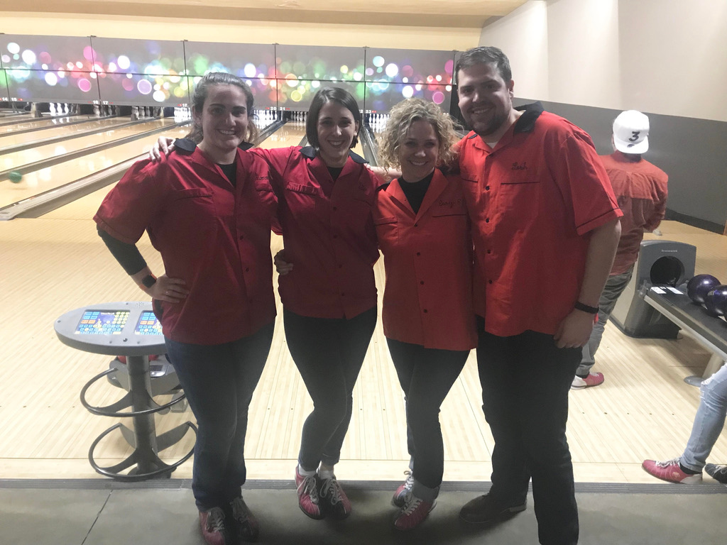 Pictures of Eve and her graduate students after bowling.